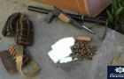 Поліція виявила в кам’янчанина зброю, набої, гранату та наркотики
